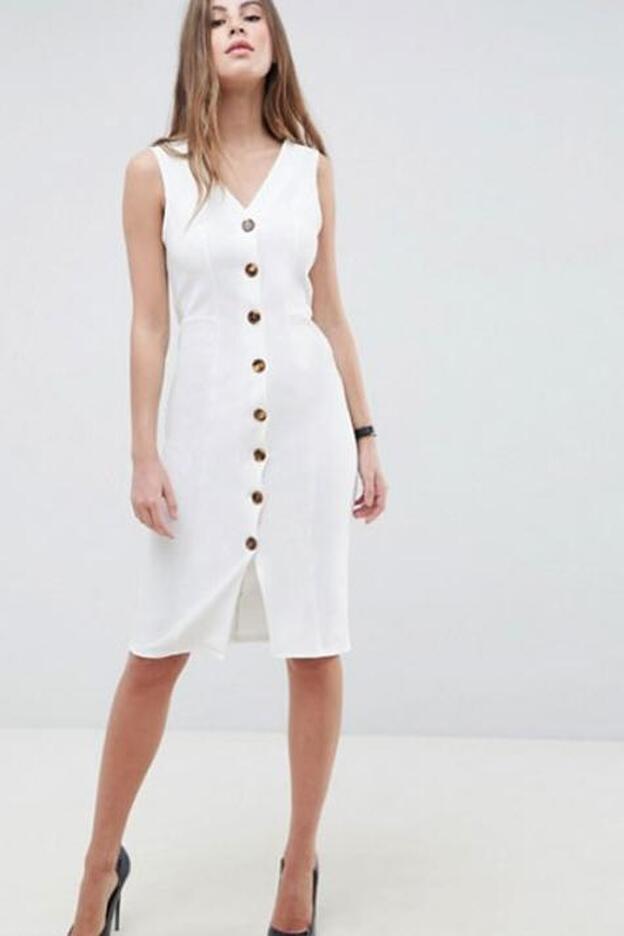 Vestido con cuello en V y botones de carey, 44,99 euros.