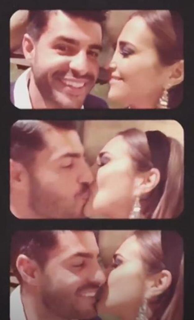 Paula Echevarría y Miguel Torres besándose ante la cámara.