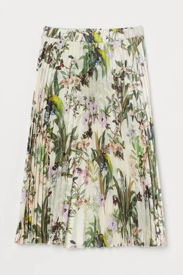 Falda midi y plisada con un fantástico estampado de flores de H&M.