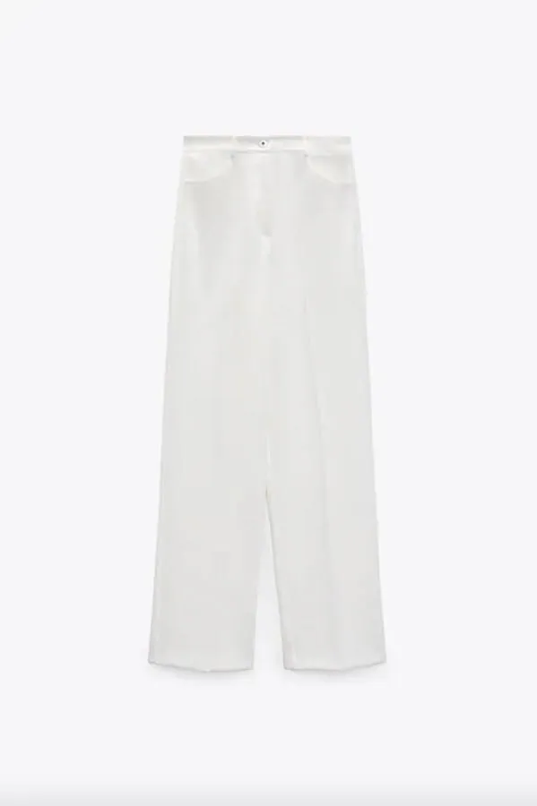 7 pantalones blancos de Zara con los que vas conseguir un look espectacular tops, camisas incluso con bikini | Mujer Hoy