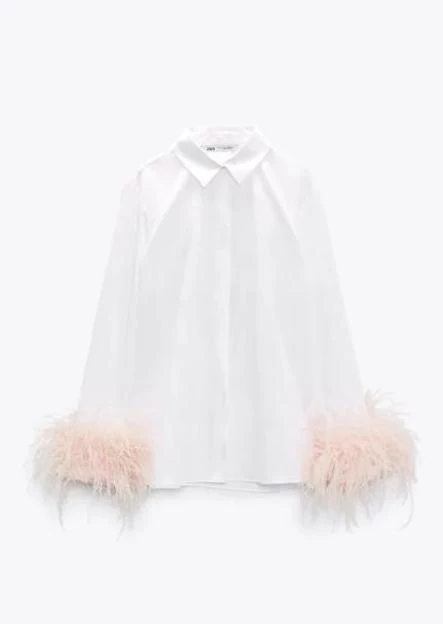 Interesante Con otras bandas Extra La camisa blanca más buscada de Zara tiene plumas y es tan ponible (y  bonita) que podrás llevarla hasta en un look de invitada | Mujer Hoy