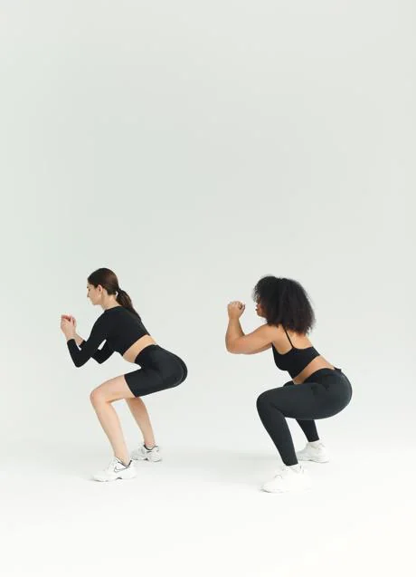Women doing squats/PEXLES