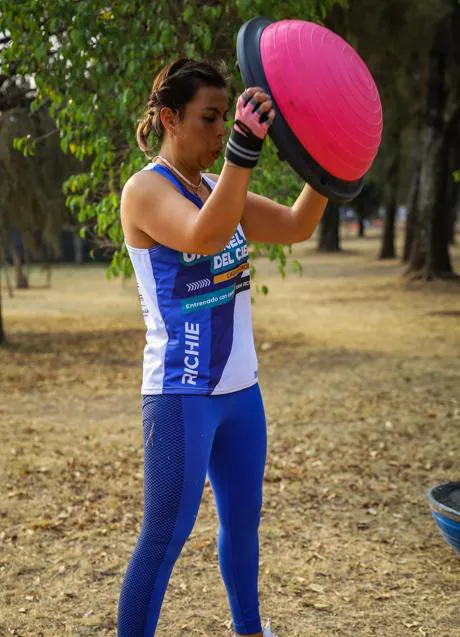 Woman training with BOSU/PEXELS ball