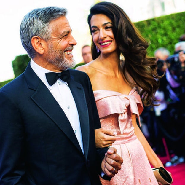 Amal Clooney acompañando al actor en el homenaje que le tributó el American Film Institute en 2018. /