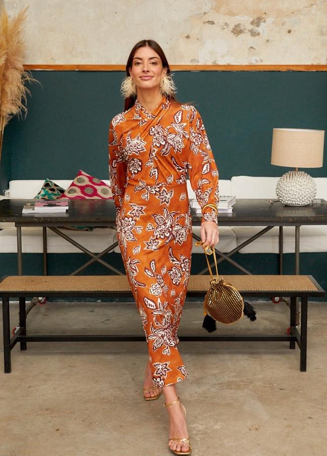 El vestido naranja de See Iou (50,95 euros).