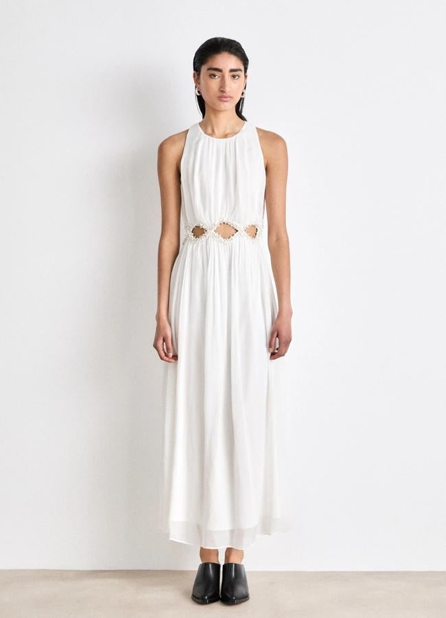 Vestido blanco con aberturas de AllSaints, 344,95 euros.