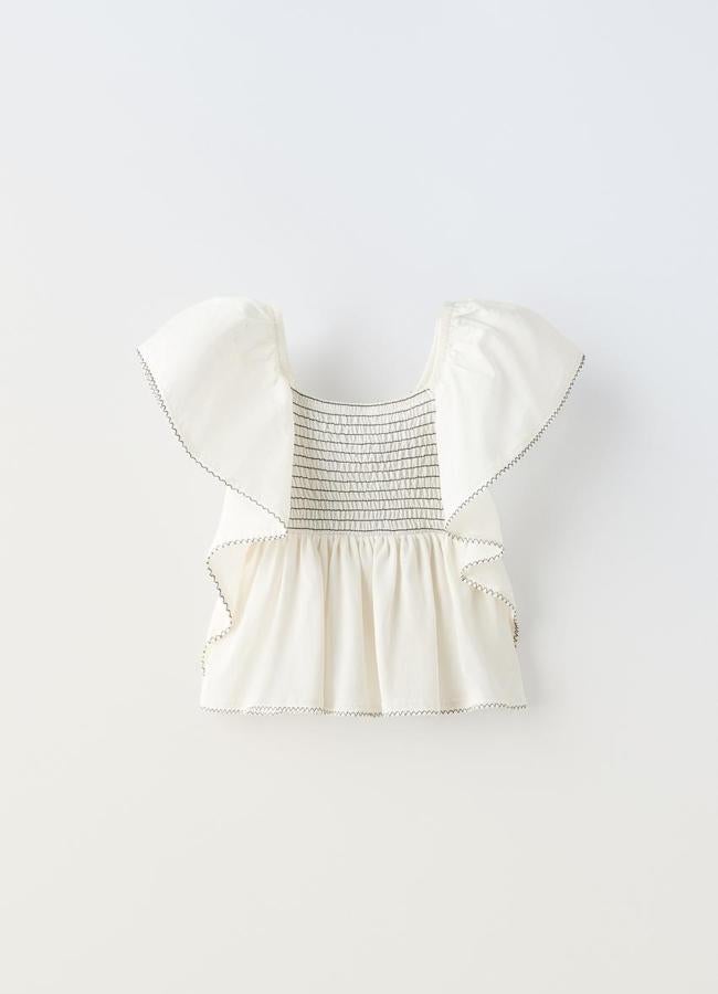 Blusa con volantes de Zara Kids.