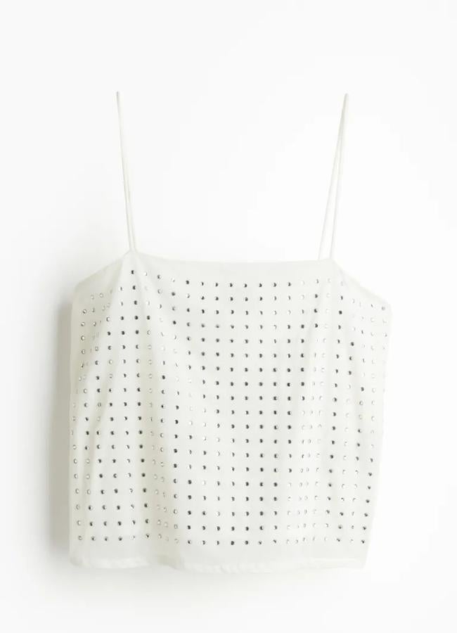 Top lencero blanco con strass de H&M, 25,99 euros.