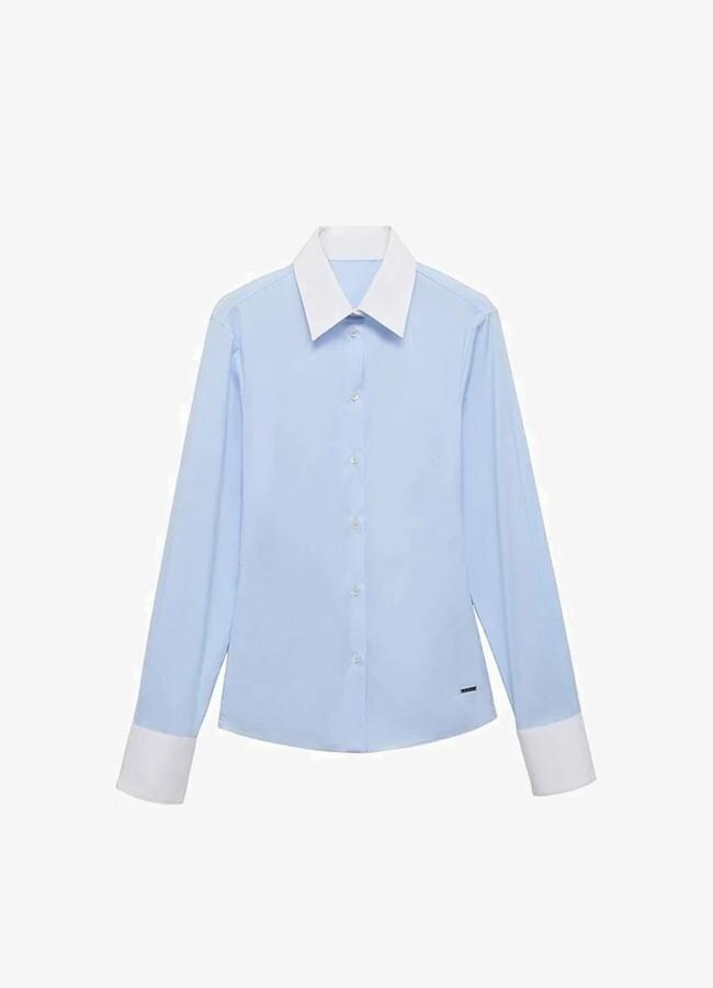 Camisa con cuello y muñecas blanco de Mango, 49,99 euros.