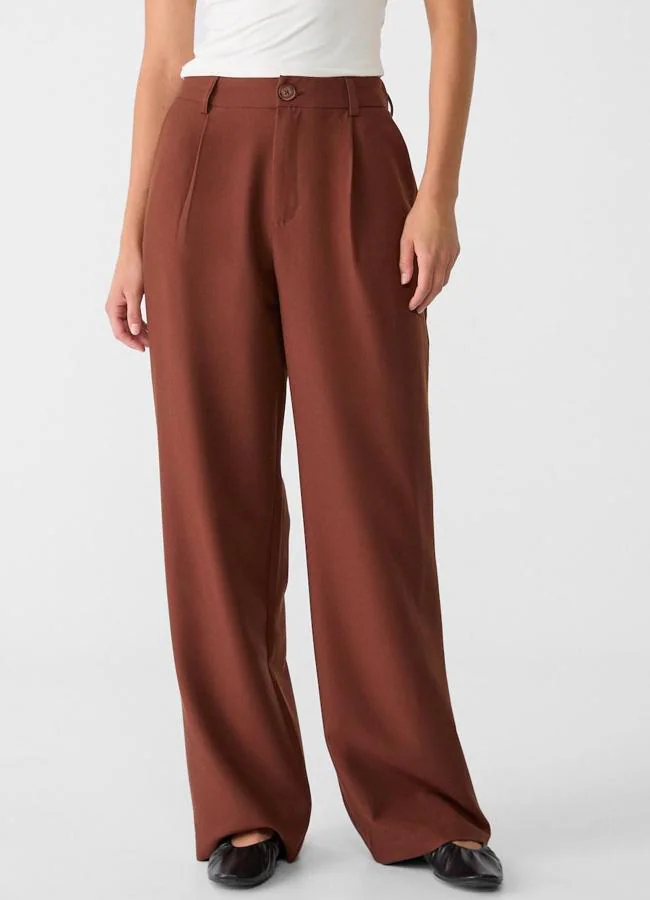 Pantalones de vestir con pinzas y cintura elástica