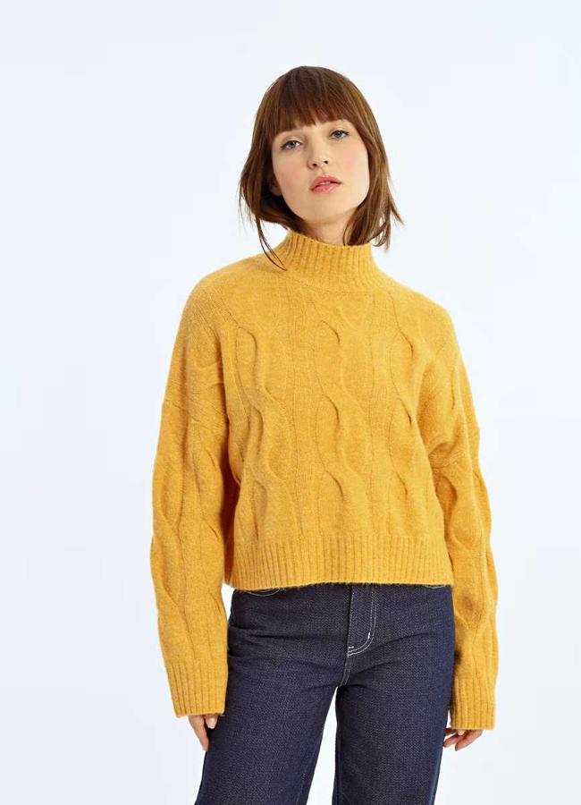 Jersey de mujer oversize en punto trenzado de Lili Sidonio (69€ en El Corte Inglés)