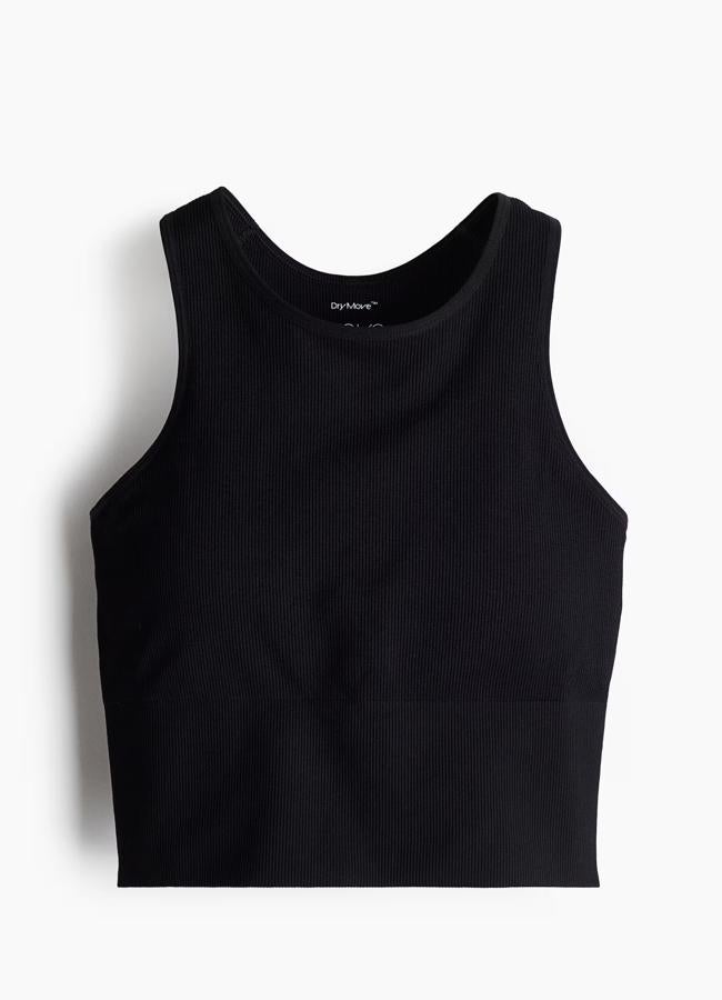 Top deportivo en negro con tejido rib de H&M (17,99 euros);