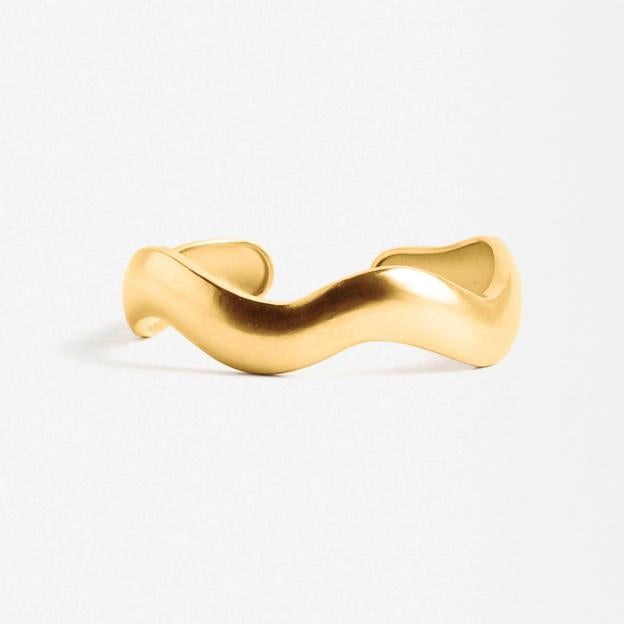 Pulsera rígida con ondas baño de oro 18k (29,99€)